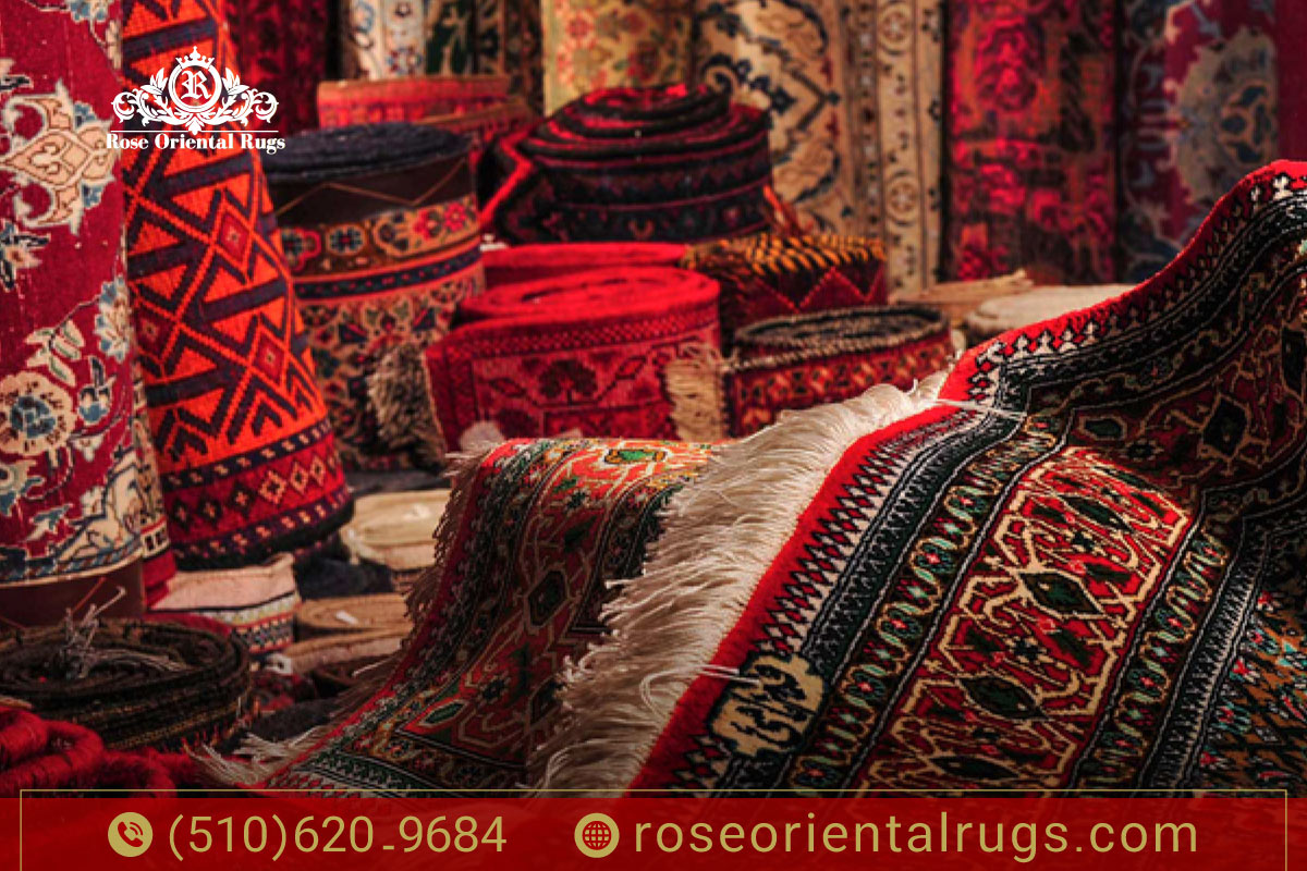 Handwoven oriental rug with intricate patterns and natural dye variations, showing authentic craftsmanship.