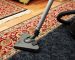 A skilled master weaver performing meticulous hand reweaving during a professional Persian rug cleaning and repair service at Rose Oriental Rugs in Berkeley.