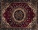 A skilled artisan at Rose Oriental Rugs in Berkeley performing a traditional immersion oriental rug cleaning and washing process in a shallow wash pool on an antique Persian wool rug.